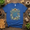 Gardening because murder is wrong quote with floral and watering can graphic on a blue t-shirt