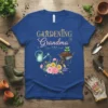 Gardening Grandma t-shirt with floral design, watering can, wheelbarrow, and flowers