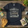 Graphic t-shirt with text "I Have Retirement Plan I Plan On Gardening And Being Grandma" in decorative font, surrounded by