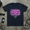 Gaslight Gatekeep Girlboss text in pink neon font with circuit board graphics on a navy t-shirt