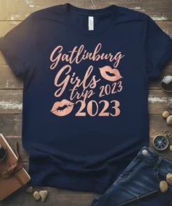 Navy blue t-shirt with rose gold text "Gatlinburg Girls trip 2023 2023" and lips graphic