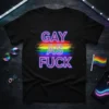 Black t-shirt with "GAY AS FUCK" in neon blue and pink text over a rainbow gradient background