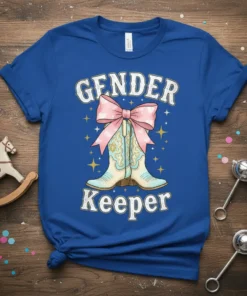 Royal blue t-shirt with "GENDER Keeper" text and cowboy boots graphic, featuring a pink bow and stars
