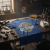 Blue t-shirt with gold and white text reading "GET IT RIGHT GET IT TIGHT" in a gear design, perfect for