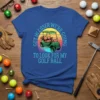 Blue t-shirt with "Get In Loser We're Going To Look For My Golf Ball" text and a golf cart graphic