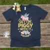 Gettin' Piggy With It With It t-shirt featuring a pink unicorn pig with wings and gold glitter text