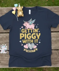 Gettin' Piggy With It With It t-shirt featuring a pink unicorn pig with wings and gold glitter text