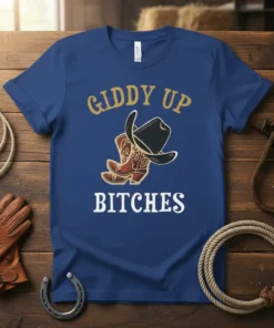 Giddy Up Bitches t-shirt featuring a gold cowboy hat and red cowboy boots graphic with white text