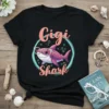 Gigi Shark t-shirt design with a cartoon shark wearing sunglasses and the text "Gigi Shark"
