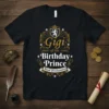Gigi of the Birthday Prince Royal Proclamation text on a black t-shirt with golden ornate border and shield graphic