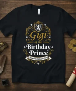 Gigi of the Birthday Prince Royal Proclamation text on a black t-shirt with golden ornate border and shield graphic