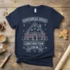 Gingerbread House Construction Crew T-Shirt design featuring a gingerbread house under construction with two gingerbread men