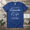 Girlfriend Fiancee Wife Est 2022 t-shirt design with white text and a crossed-out "Girlfriend" and "Fiancee" to highlight "Wife"