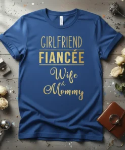 Girlfriend Fiancée Wife & Mommy text design on a royal blue t-shirt, with gold glitter font