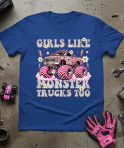 Girls Like Monster Trucks Too text design with a pink monster truck and floral accents, on a blue t-shirt