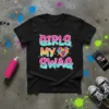 Black t-shirt with "GIRLS MY SWAG" text and a colorful geometric heart graphic
