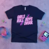 GIRLS RULE BOYS DROOL text in neon pink and blue on a navy t-shirt, with geometric lines and dots