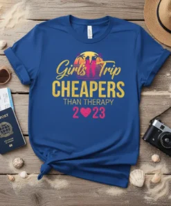 Girls' Trip CHEAPERS THAN THERAPY ???? 2023 text design with palm trees and sunset graphic on a blue t-shirt
