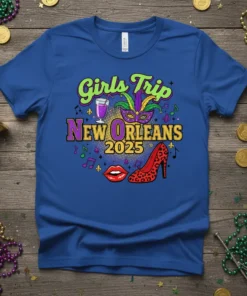 Girls Trip New Orleans 2025 text with Mardi Gras mask, high heel, and cocktail graphic on a royal blue t-shirt