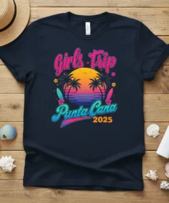 Girls Trip Punta Cana 2025 text with palm trees and sunset graphic on a navy t-shirt