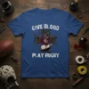 Give Blood Play Rugby text design with a graphic heart, cross, and rugby ball. Blue t-shirt graphic
