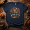 Give Thanks to the Lord psalm 106:1 Thanksgiving T-Shirt with autumn wreath and pumpkins graphic