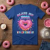 Glaze My Hole It's My Birthday text above a pink heart-shaped donut with sprinkles on a blue t-shirt
