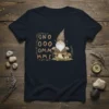 Gno Ooo Omm Me text with a meditating gnome on a mushroom, surrounded by plants, on a dark t-shirt