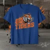 Go Tigers t-shirt design with a roaring tiger graphic and distressed orange lettering