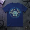 Navy blue t-shirt with a circular design featuring a circuit board-like paw print and the quote "Theay day God dogs