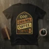 Black t-shirt with GOD. DRUMS. COFFEE. COFFEE. text design in vintage style, featuring musical notes and a French press graphic