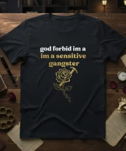Black t-shirt with white and gold text "god forbid im a im a sensitive gangster" and a golden rose graphic