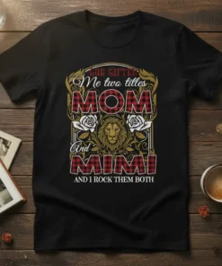 God Gifted Me Two Titles Mom And Mimi And I Rock Them Both text with lion graphic and plaid design