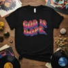 God Is Dope. text in retro wavy font with vibrant pink, orange, and blue colors on a black t-shirt