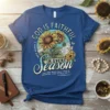Blue t-shirt with "God Is Faithful In Every Season" text and a sunflower graphic, including 1 Thess 5:24 scripture