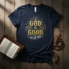 God Is Good All The Time quote on navy t-shirt with gold and white lettering and starburst graphic