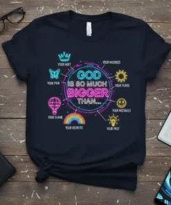 Christian t-shirt design with neon text "GOD IS SO MUCH BIGGER THAN..." surrounded by icons representing pain, shame, regrets, hurt