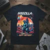 Godzilla King of the Monsters Happy Birthday T-Shirt design with Godzilla holding balloons and wearing a party hat