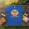 Golden Mama t-shirt featuring a retro sunset graphic of a happy Golden Retriever wearing sunglasses, text says GOLDEN MAMA