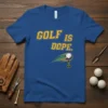 Blue t-shirt with yellow text "GOLF IS DOPE" and a golf ball on a tee with green and yellow streaks