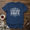 Navy t-shirt with white text "GOOD DAY, SIR. I SAID GOOD DAY! EST. 2024" in vintage style with lion graphics