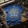 Good Grandmas Say Bad Words text design on a navy blue t-shirt with floral embellishments