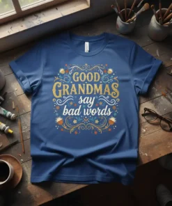 Good Grandmas Say Bad Words text design on a navy blue t-shirt with floral embellishments