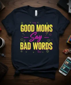 GOOD MOMS Say BAD WORDS text design on a dark t-shirt with neon yellow and pink lettering