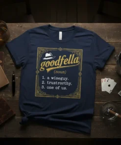 Goodfella definition t-shirt with gold text: "goodfella (noun) 1. a wiseguy. 2. trustrorthy. 3. one of us." and a fedora