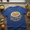 Got latkes? text with illustration of latkes on a plate, forks, and laurel wreath on a blue t-shirt