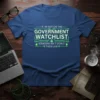 T-shirt with the quote "If I'm Not On The Government Watchlist Someone Isn't Doing Their Job" in green tech-style font