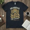 Grandad The Man The Myth The Legend quote t-shirt with a lion emblem and laurel wreath design