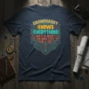 Granddaddy Knows Everything and If He Doesn't He Can Make Stuff Up Really Fast quote on a dark t-shirt with