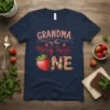 Grandma of the Berry Sweet One t-shirt with strawberry graphics and glitter text for a first birthday celebration